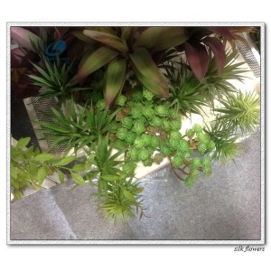 http://www.ls-decos.com/327-1110-thickbox/artificial-succulents.jpg